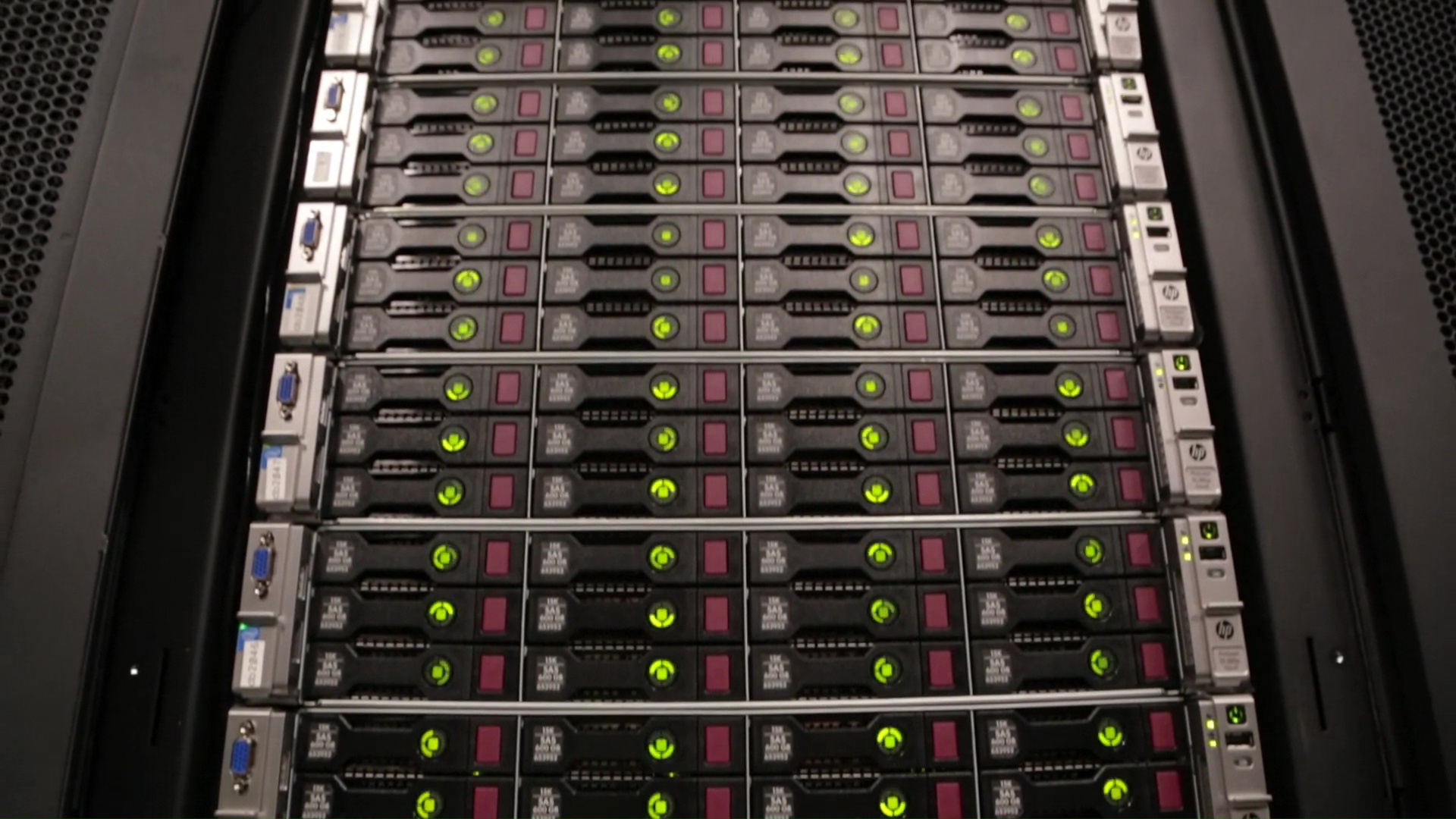 Close view of locked server racks filled with storage hardware