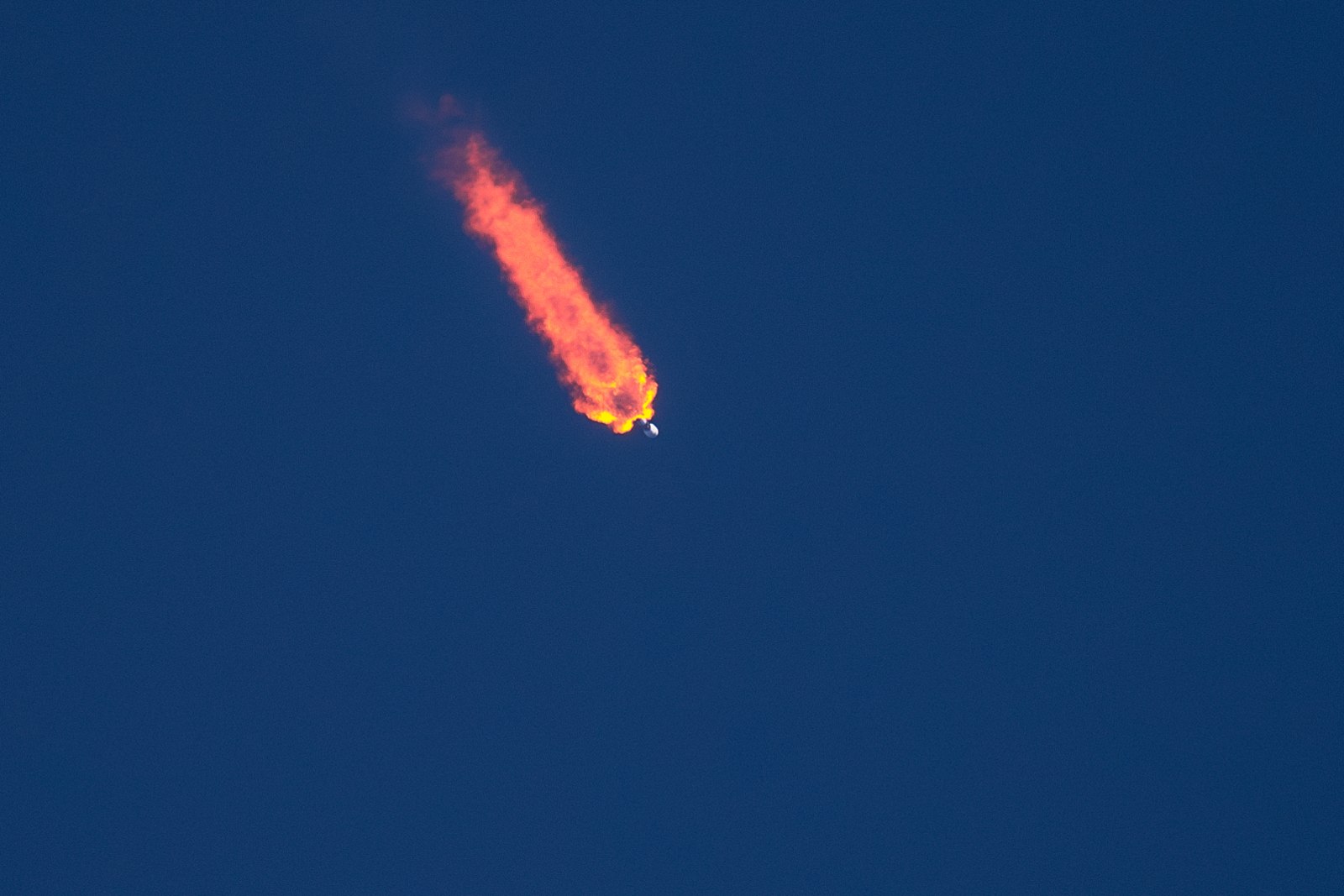 A SpaceX Falcon 9 rocket climbing into the sky during the Starlink 6-39 launch