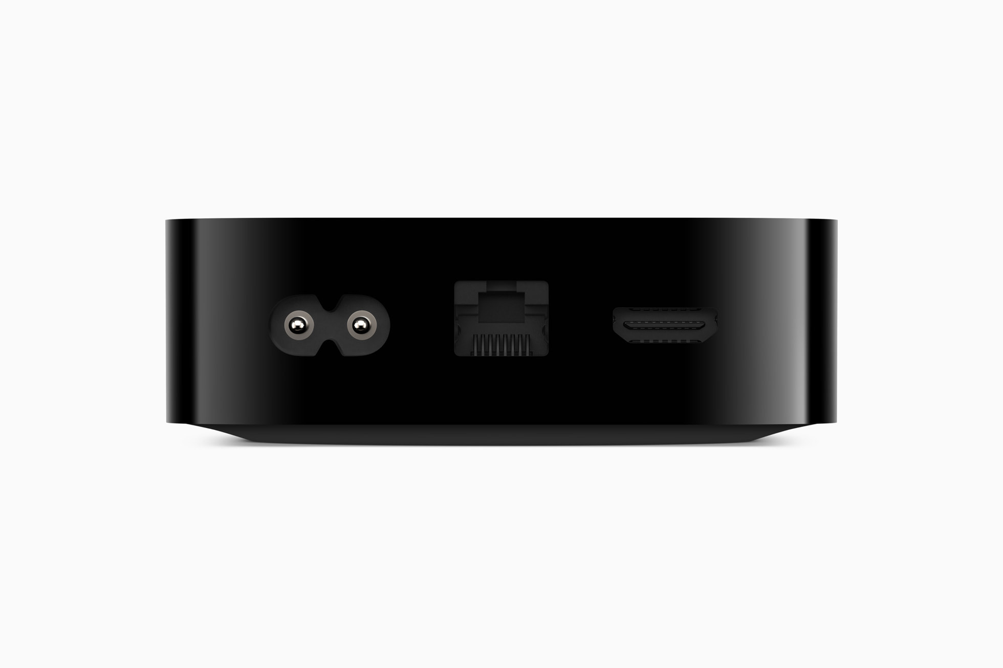 Rear view of Apple TV 4K showing its power, HDMI, and Ethernet ports