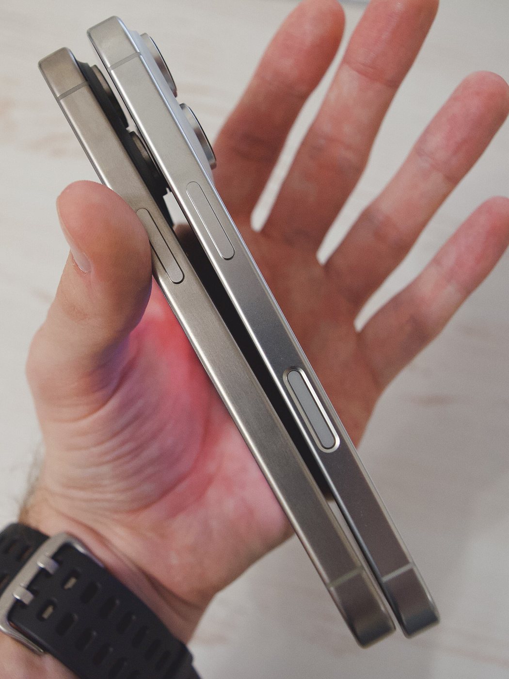 An iPhone 16 Pro and an iPhone 15 Pro side by side